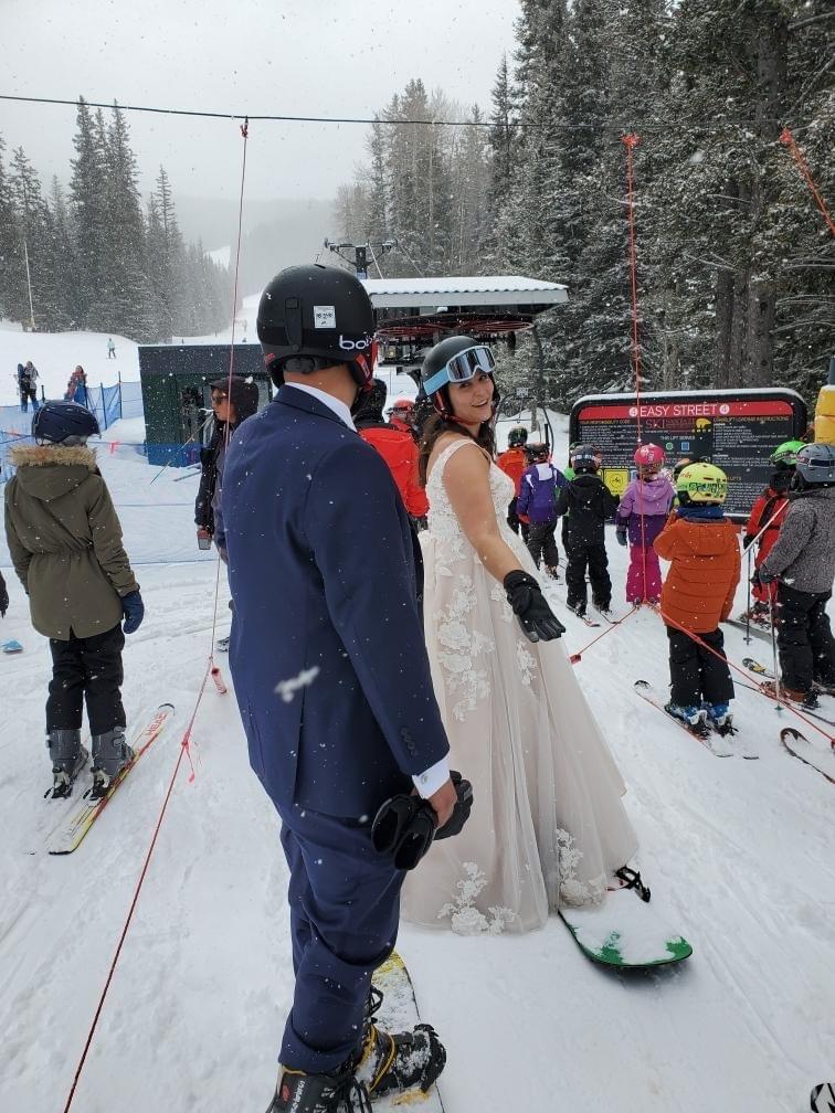 sent by one of tyla's bride, and one of the most amazing shots of our brides snowboarding with her wedding dress and husband with his suit.